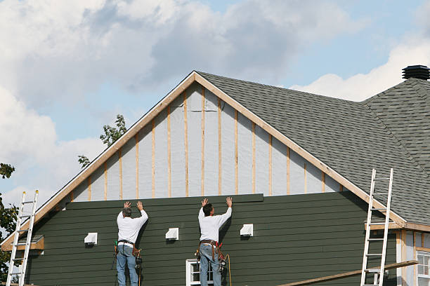 Professional Siding technician working in Clifton, VA